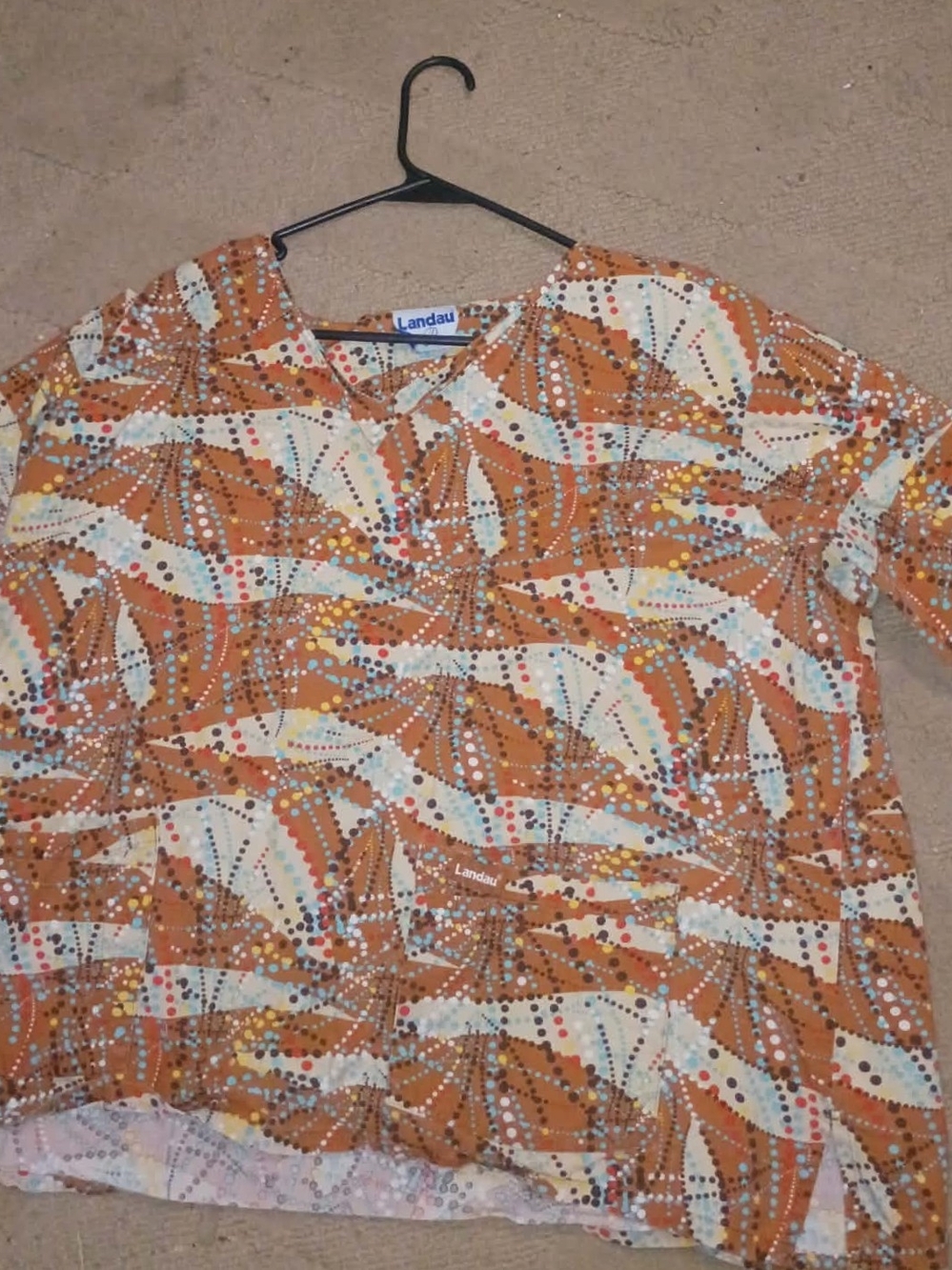 Landau Women's Orange and Cream Printed V-Neck Tunic